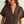 Woman wearing a brown short-sleeve blouse with buttons on a plain background