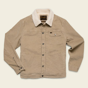 Howler Bros Beige corduroy jacket with white fur collar on a beige background