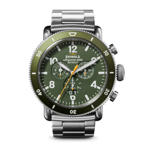 Green shinola watch with silver band on a transparent background