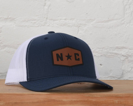 North Carolina Chimney Rock Snapback Hat: Navy/White