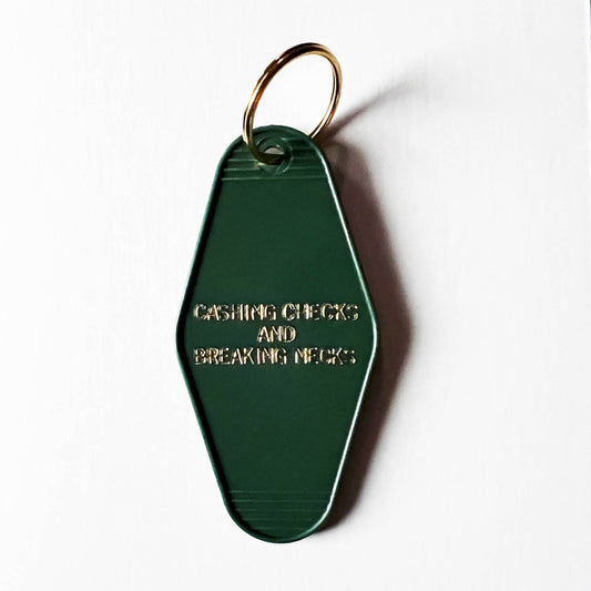 Cashing Checks & Breaking Necks Retro Motel Keychain